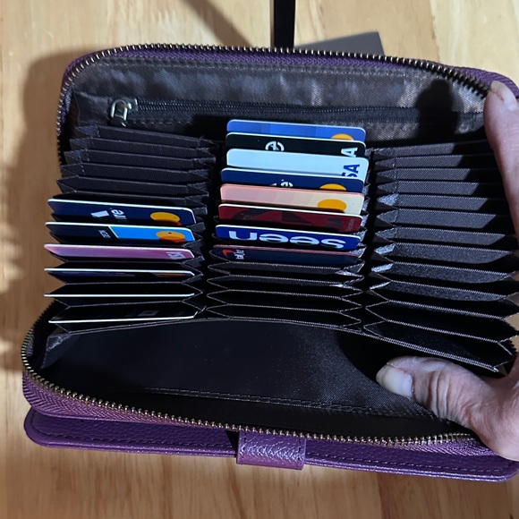 NWT. Purple Leather Women\'s wallet or wristlet